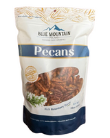 Bag of Blue Mountain Pecans with pecans and rosemary on the packaging.