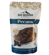Bag of Blue Mountain Pecans with pecan illustrations on a white background