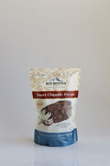Bag of Blue Mountain Sweet Chipotle Pecans on a light gray background